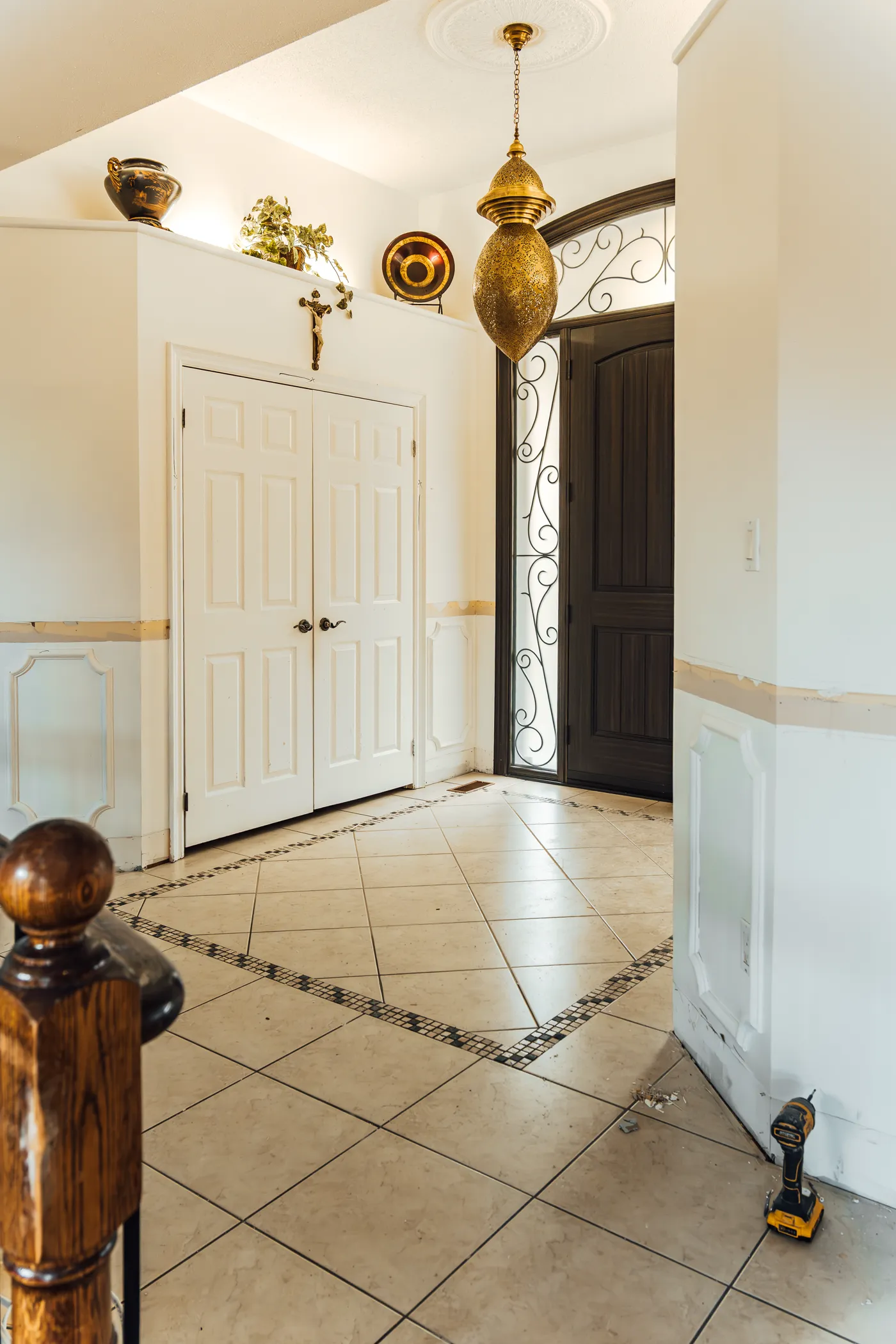 Living space with an arched window, a Campoli build