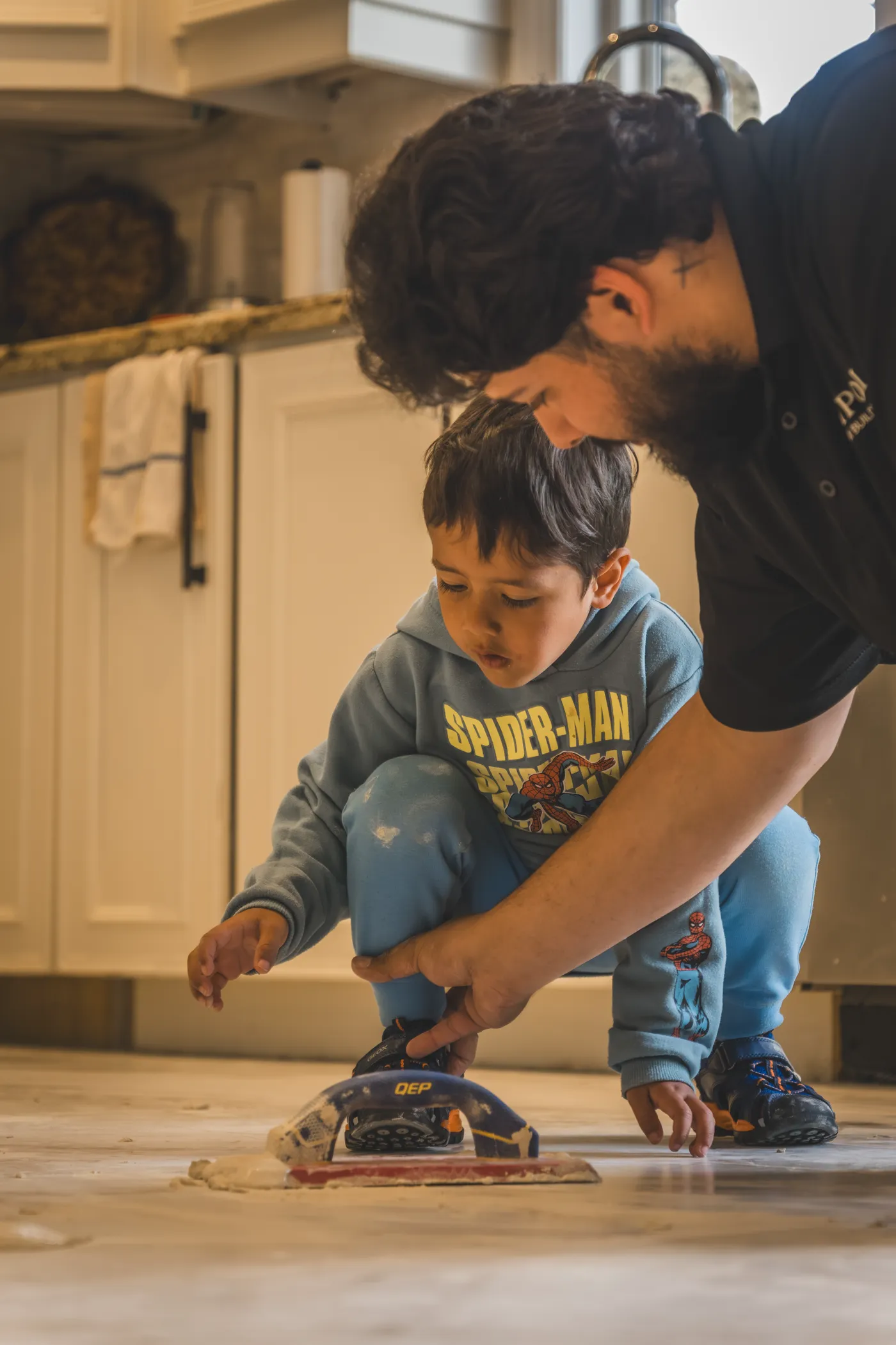 Luca on site with his son, Campoli Custom Builds